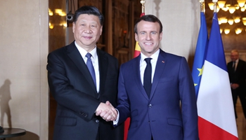 Xi meets Macron on maintaining sound China-France ties